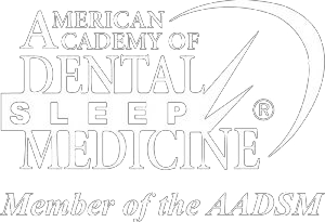 American Academy of Dental Sleep Medicine member logo in white, signifying accreditation